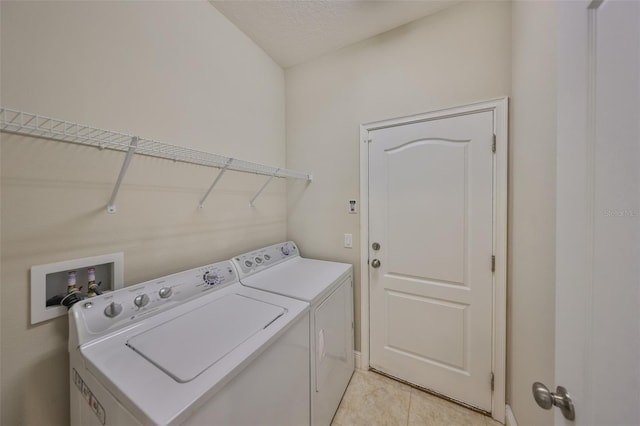 838 Vino Verde Cir, Brandon, FL 33511 - washroom with light tile patterned floors, washer and dryer, and laundry area