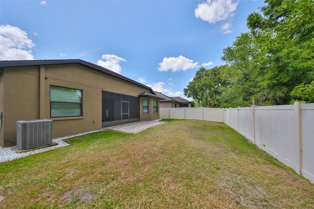 838 Vino Verde Cir, Brandon, FL 33511 - view of yard featuring a fenced backyard and central AC unit