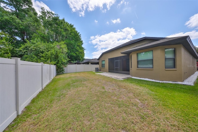 838 Vino Verde Cir, Brandon, FL 33511 - back of property with a patio, a fenced backyard, stucco siding, and a lawn