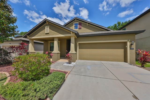 838 Vino Verde Cir, Brandon, FL 33511 - view of front of home featuring an attached garage, driveway, and stucco siding