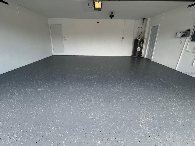 4804 Longwater Way, Tampa, FL 33615 - garage with electric water heater and a garage door opener