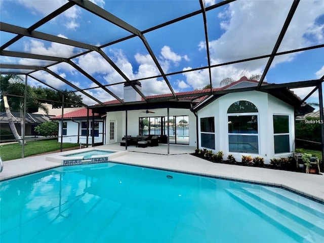 4804 Longwater Way, Tampa, FL 33615 - view of pool featuring a patio area, an outdoor hangout area, ceiling fan, a pool with connected hot tub, and glass enclosure