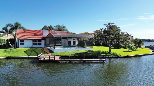 4804 Longwater Way, Tampa, FL 33615 - dock with a water view, an outdoor pool, a lanai, and a lawn