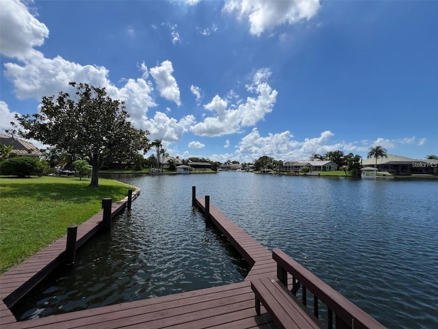 4804 Longwater Way, Tampa, FL 33615 - dock with a water view and a lawn