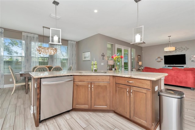 3408 W Bay Ave, Tampa, FL 33611 - kitchen featuring stainless steel dishwasher, brown cabinetry, decorative light fixtures, a sink, and open floor plan