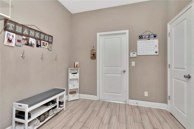 3408 W Bay Ave, Tampa, FL 33611 - mudroom with wood tiled floor and baseboards