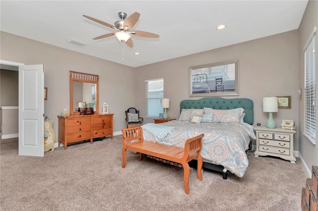 3408 W Bay Ave, Tampa, FL 33611 - bedroom with a ceiling fan, visible vents, and carpet floors