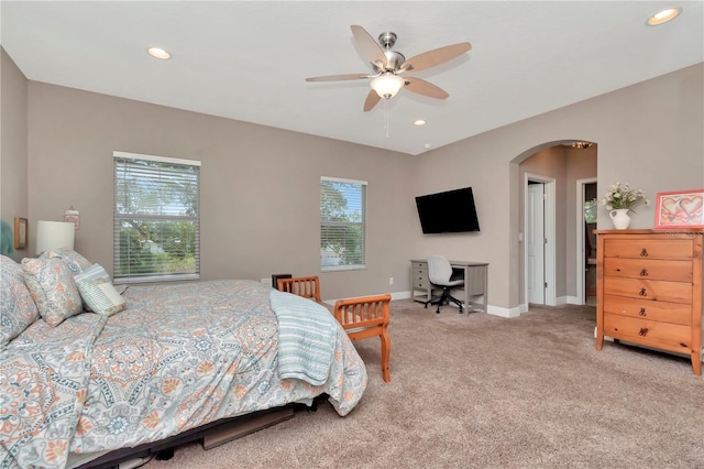 3408 W Bay Ave, Tampa, FL 33611 - bedroom with recessed lighting, arched walkways, multiple windows, and carpet