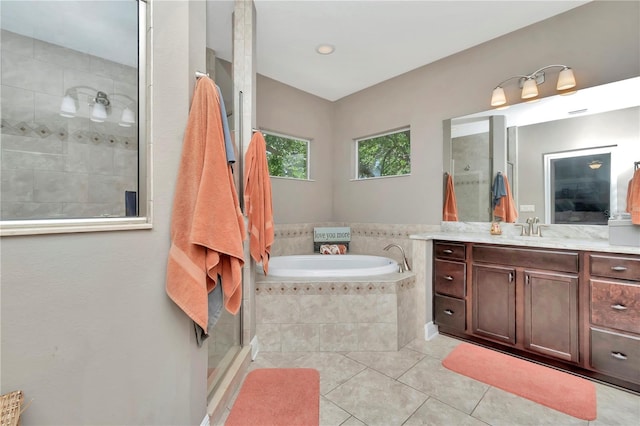 3408 W Bay Ave, Tampa, FL 33611 - full bath with a garden tub, a stall shower, tile patterned floors, and vanity