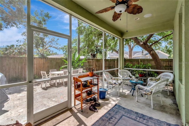 3408 W Bay Ave, Tampa, FL 33611 - sunroom / solarium with outdoor dining space and a ceiling fan