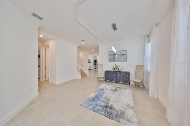 sitting room featuring crown molding, stairs, baseboards, light tile patterned flooring, and visible vents