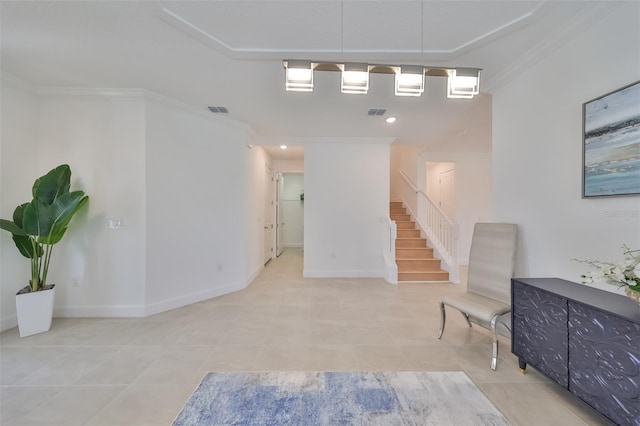 sitting room featuring ornamental molding, baseboards, stairway, and visible vents