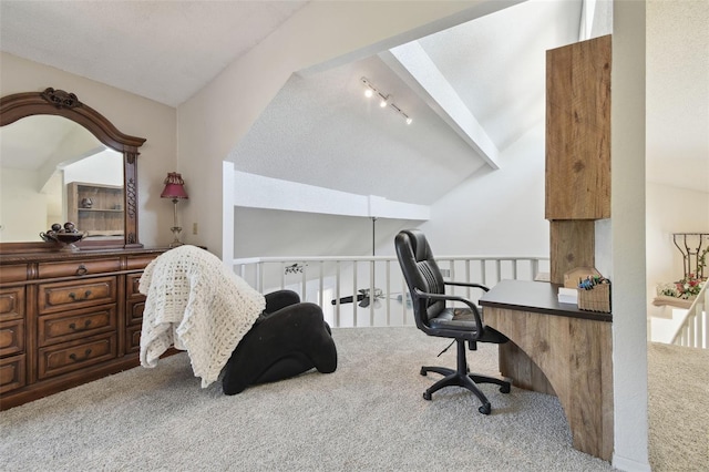 office space featuring vaulted ceiling with beams and carpet flooring