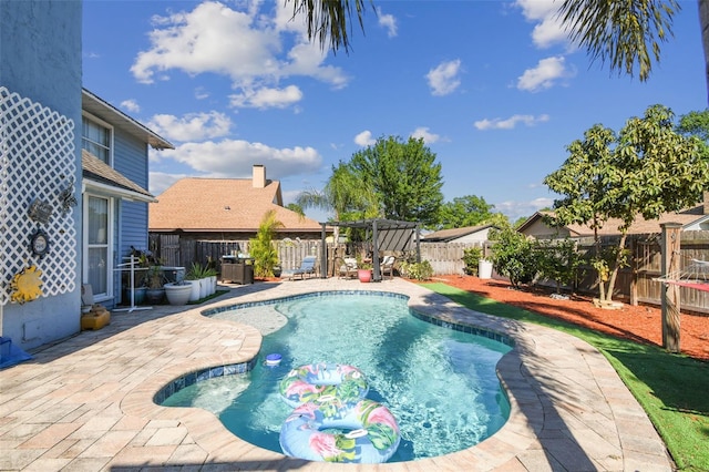 view of pool with a fenced backyard, a pergola, a patio, and a fenced in pool