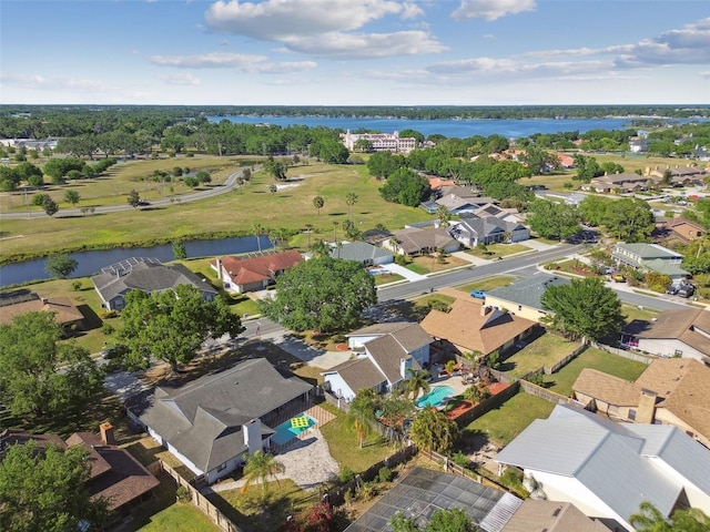 aerial view with a residential view and a water view