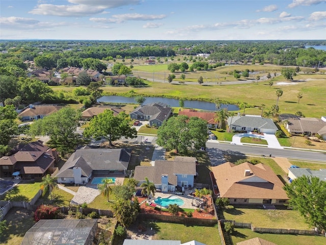 aerial view with a residential view and a water view