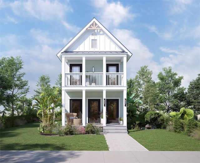 2308 N 13th St, Tampa, FL 33605 - view of front of house featuring a balcony, a porch, board and batten siding, a front yard, and a standing seam roof