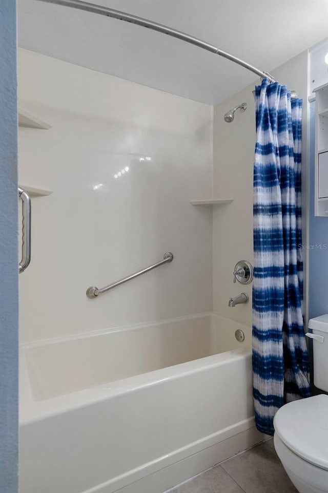 5814 Silver Moon Ave, Tampa, FL 33625 - full bathroom with toilet, tile patterned flooring, and shower / bath combo with shower curtain