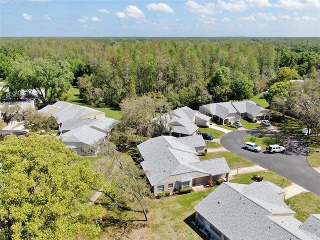 4851 Leyte Ct, New Port Richey, FL 34655 - aerial view of residential area with a forest