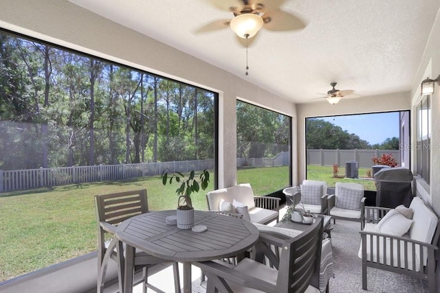 10703 Morning Dew Way, Tampa, FL 33647 - sunroom featuring outdoor dining space, an outdoor hangout area, and a ceiling fan