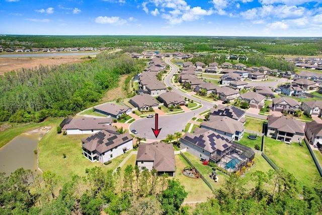 10703 Morning Dew Way, Tampa, FL 33647 - bird's eye view with a residential view and a forest view