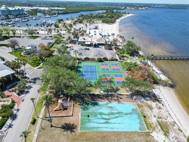 birds eye view of property with a water view