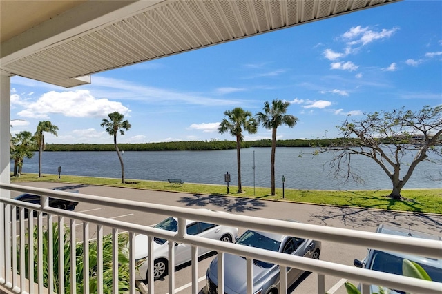 balcony featuring a water view
