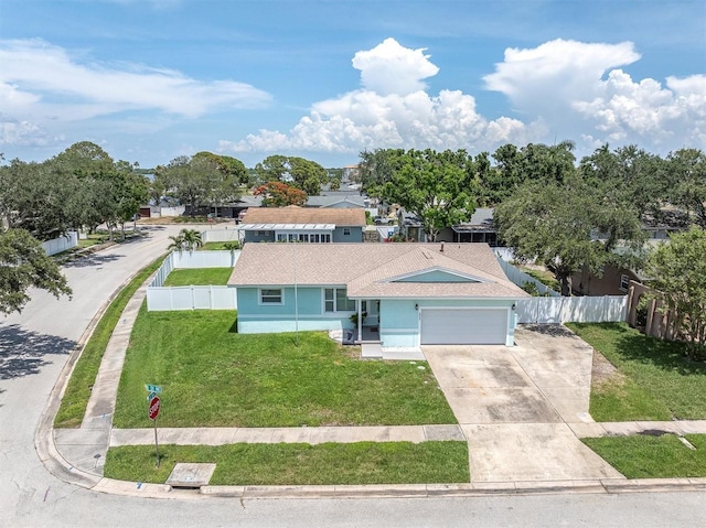 6035 19th St NE, Saint Petersburg, FL 33703 - view of front of home featuring concrete driveway, a garage, stucco siding, and roof with shingles