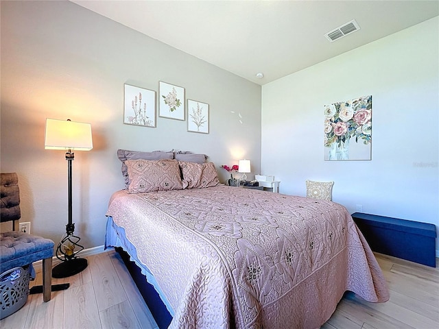 20983 Monza Loop, Land O Lakes, FL 34638 - bedroom featuring wood finished floors and baseboards