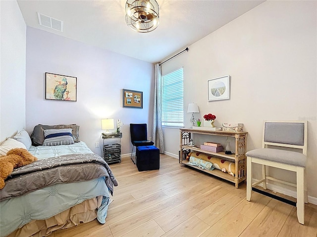 20983 Monza Loop, Land O Lakes, FL 34638 - bedroom featuring wood finished floors and baseboards