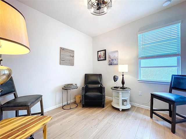 20983 Monza Loop, Land O Lakes, FL 34638 - sitting room featuring light wood-style floors and baseboards