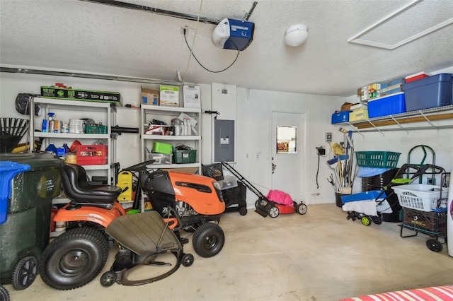 garage with a garage door opener and electric panel