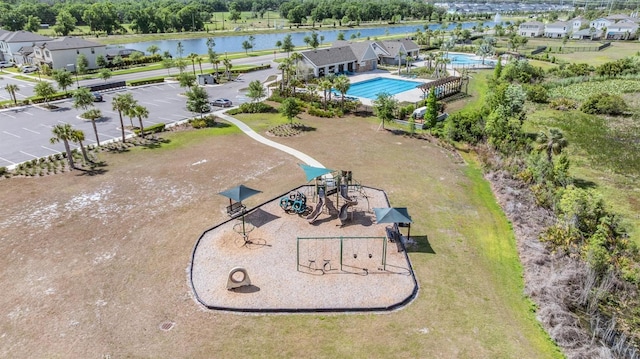 bird's eye view with a water view