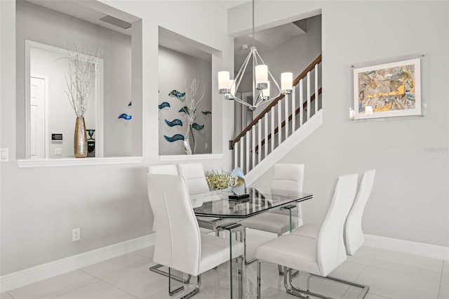 11014 Rustic Timber Loop, San Antonio, FL 33576 - dining area featuring stairway, visible vents, baseboards, and a notable chandelier