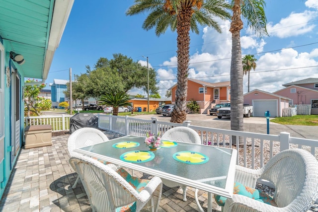 balcony featuring a residential view and outdoor dining area