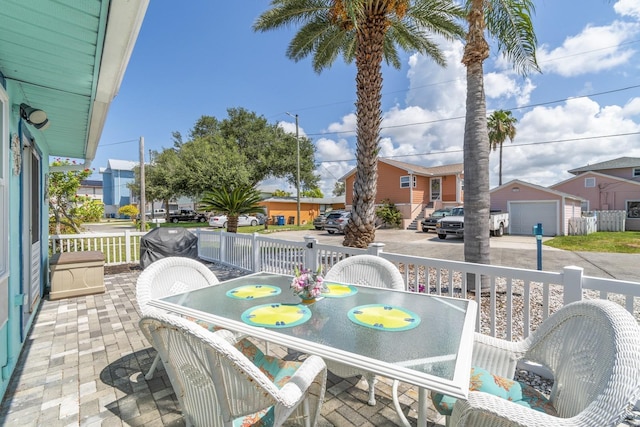 13200 Boca Ciega Ave, Madeira Beach, FL 33708 - balcony with outdoor dining area and a residential view