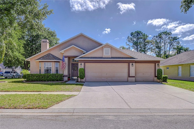 view of front of home featuring concrete driveway, stucco siding, a chimney, an attached garage, and a front yard