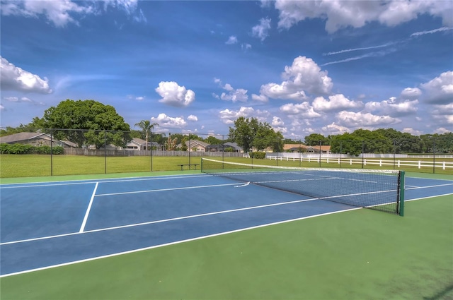 view of sport court with fence and community basketball court