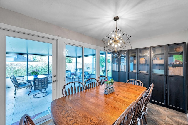 13308 Kearney Way, Tampa, FL 33626 - dining space with a chandelier