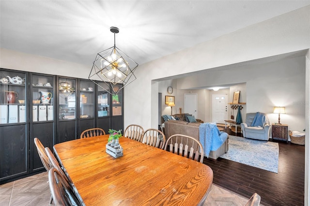 13308 Kearney Way, Tampa, FL 33626 - dining space with a chandelier and parquet floors