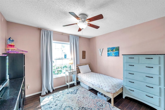 13308 Kearney Way, Tampa, FL 33626 - bedroom featuring a textured ceiling, ceiling fan, baseboards, and dark wood finished floors