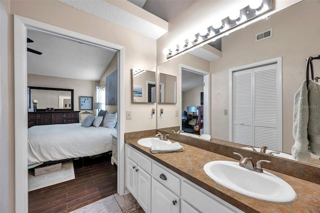 13308 Kearney Way, Tampa, FL 33626 - ensuite bathroom with a sink, visible vents, a closet, and ensuite bath
