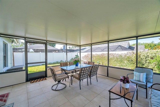 13308 Kearney Way, Tampa, FL 33626 - sunroom with outdoor dining area