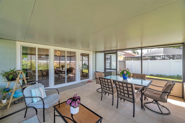13308 Kearney Way, Tampa, FL 33626 - sunroom featuring outdoor dining area and a wealth of natural light