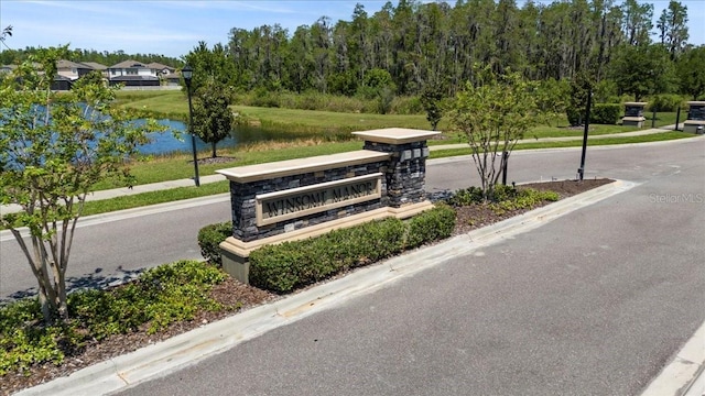 view of property's community featuring a water view