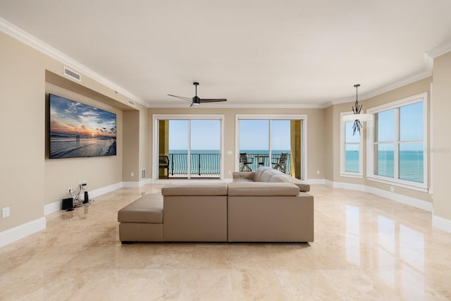 13600 Gulf Blvd Unit 700A, Saint Petersburg, FL 33708 - living area with crown molding, a ceiling fan, baseboards, and a water view
