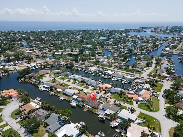 aerial view with a residential view and a water view