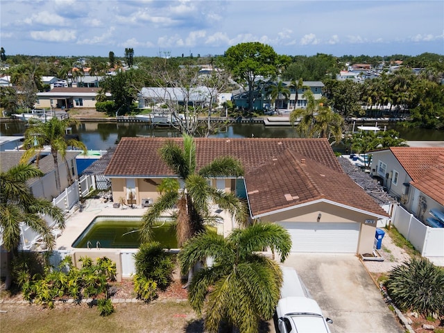 aerial view with a water view and a residential view