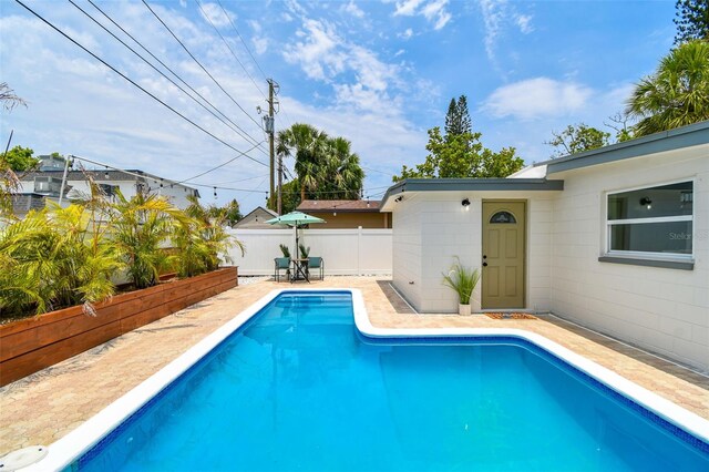 3066 Highland St N, Saint Petersburg, FL 33704 - view of pool with a patio and a fenced backyard