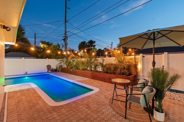 3066 Highland St N, Saint Petersburg, FL 33704 - view of swimming pool with a patio and a fenced backyard